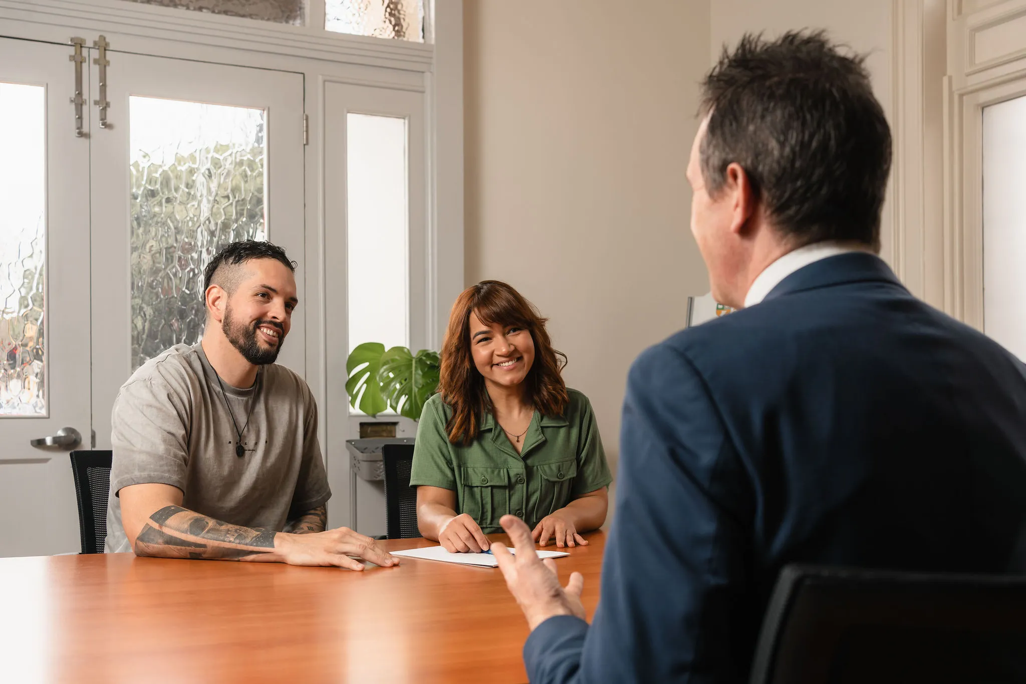 Chris Johnston consulting two clients